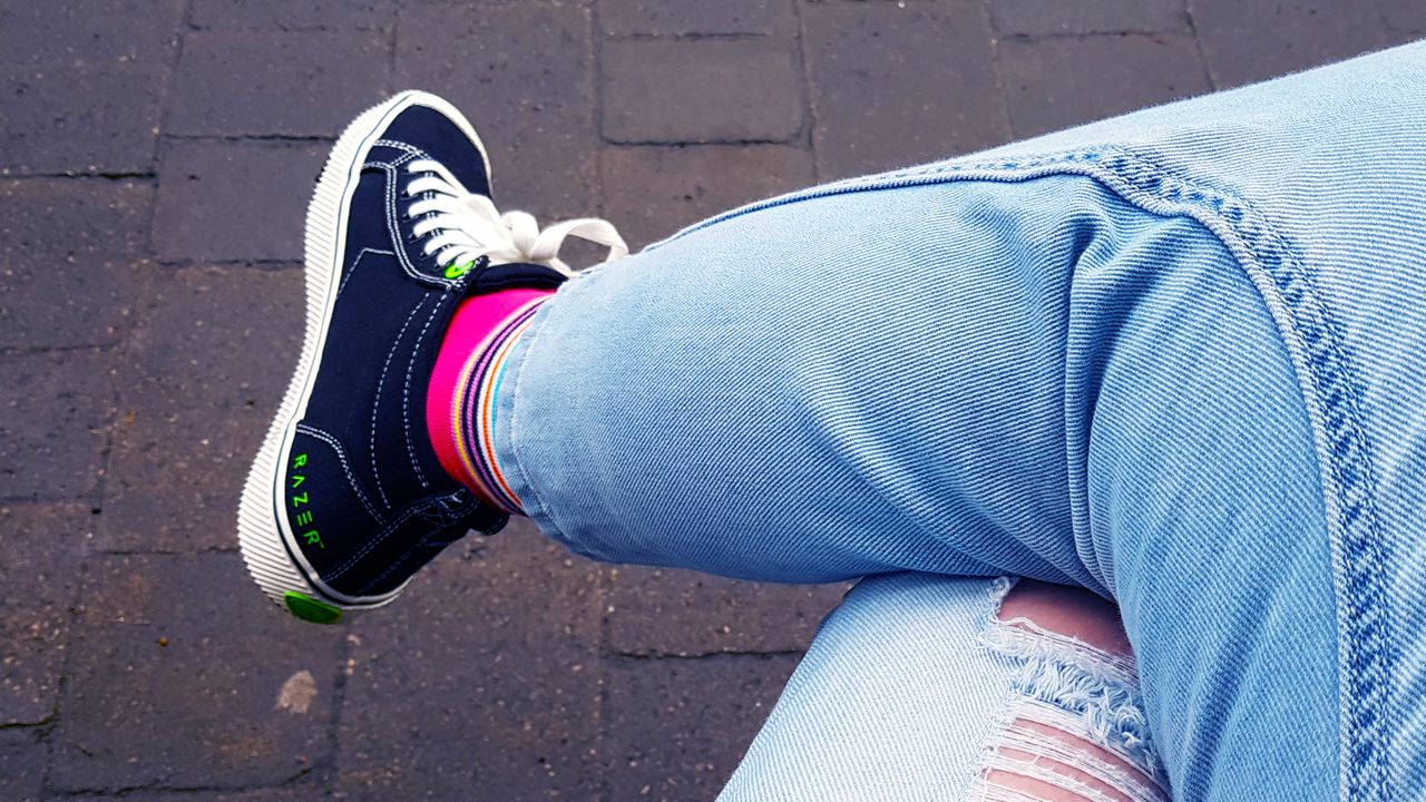 Katie sporting Razer's Sneki Snek Sneakers.