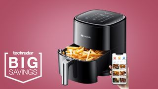The Proscenic T22 air fryer on a pink background