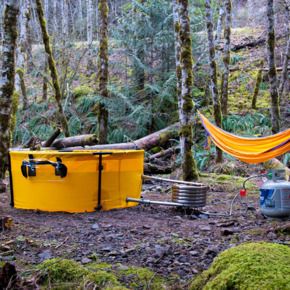 A collapsible, portable hot tub