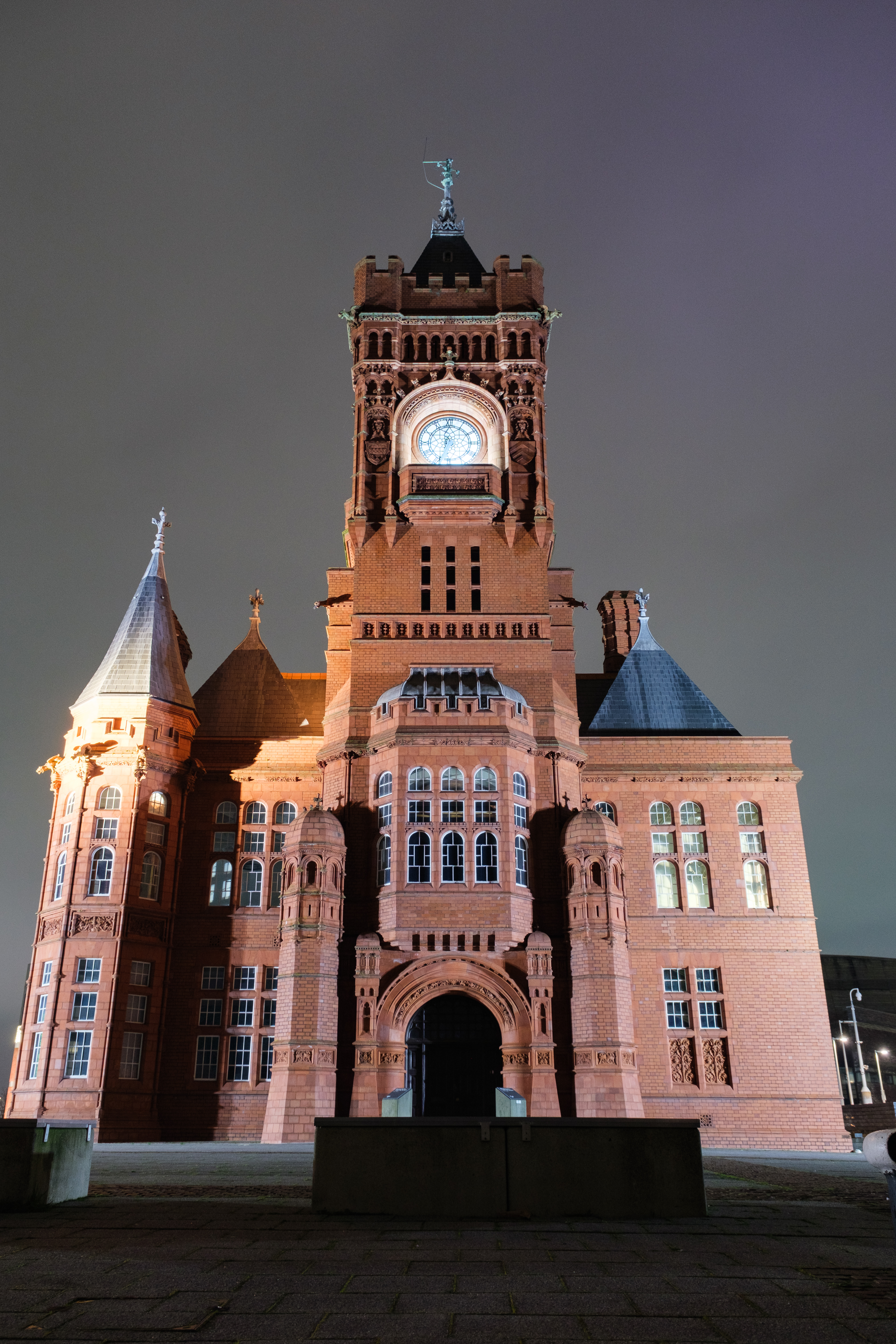 A photograph of the Cardiff Pierhead building taken at night