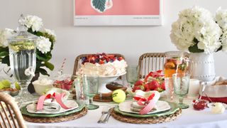dining table with cake and tenniscore theme