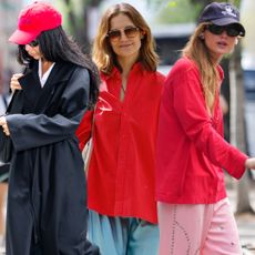collage of celebrities wearing strawberry red color trend