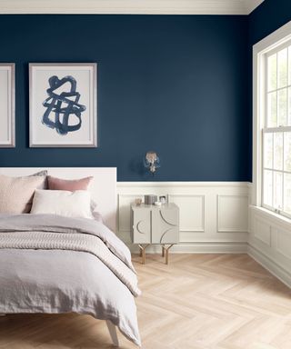 Blue paint in a white and cream bedroom