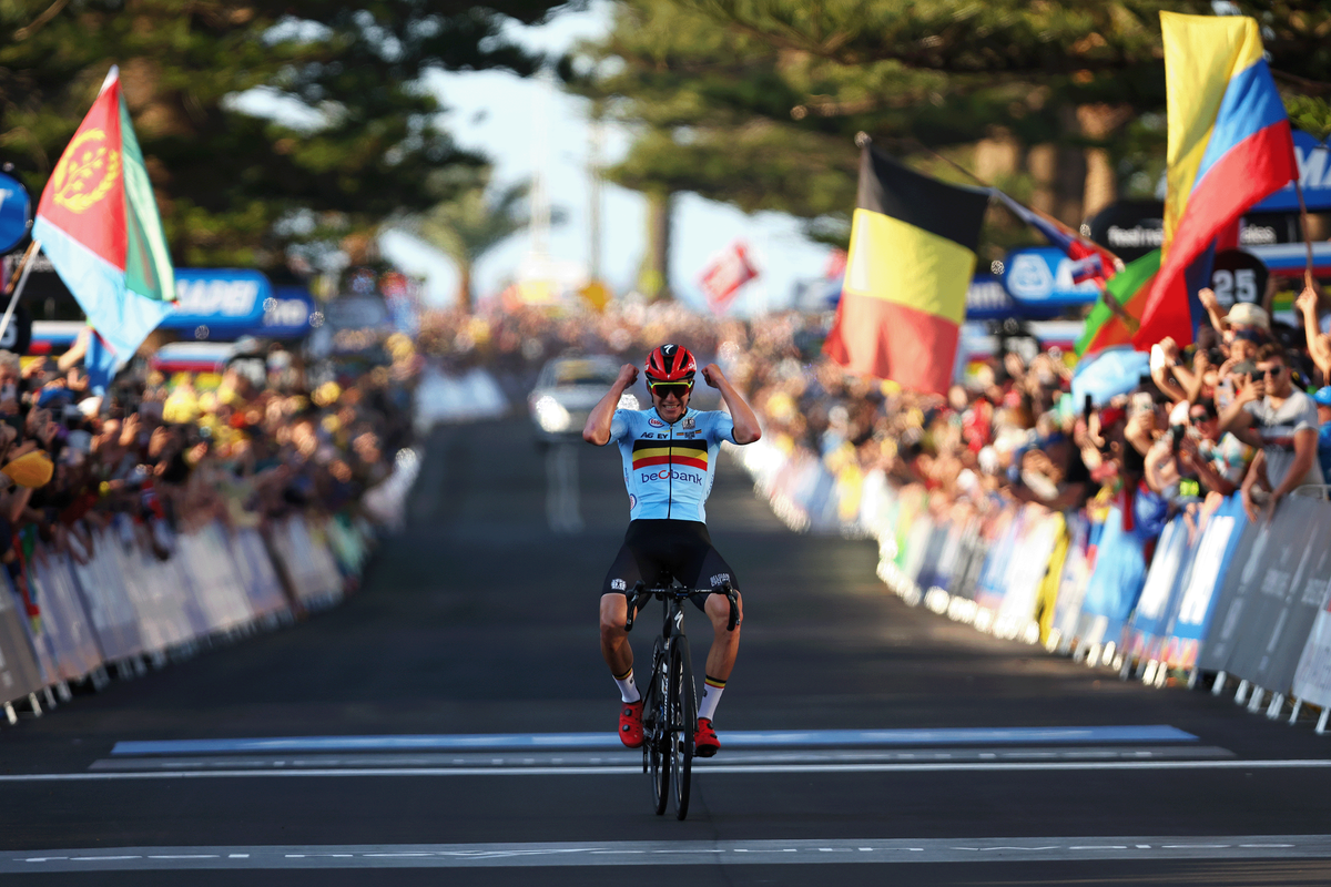Remco Evenepoel of Belgium celebrates at finish line as race winner during the 95th UCI Road World Championships 2022, Men Elite Road Race a 266,9km race from Helensburgh to Wollongong / #Wollongong2022 / on September 25, 2022 in Wollongong, Australia. (Photo by Con Chronis/Getty Images)