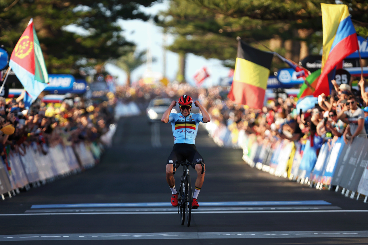 Remco Evenepoel of Belgium celebrates at finish line as race winner during the 95th UCI Road World Championships 2022, Men Elite Road Race a 266,9km race from Helensburgh to Wollongong / #Wollongong2022 / on September 25, 2022 in Wollongong, Australia. (Photo by Con Chronis/Getty Images)
