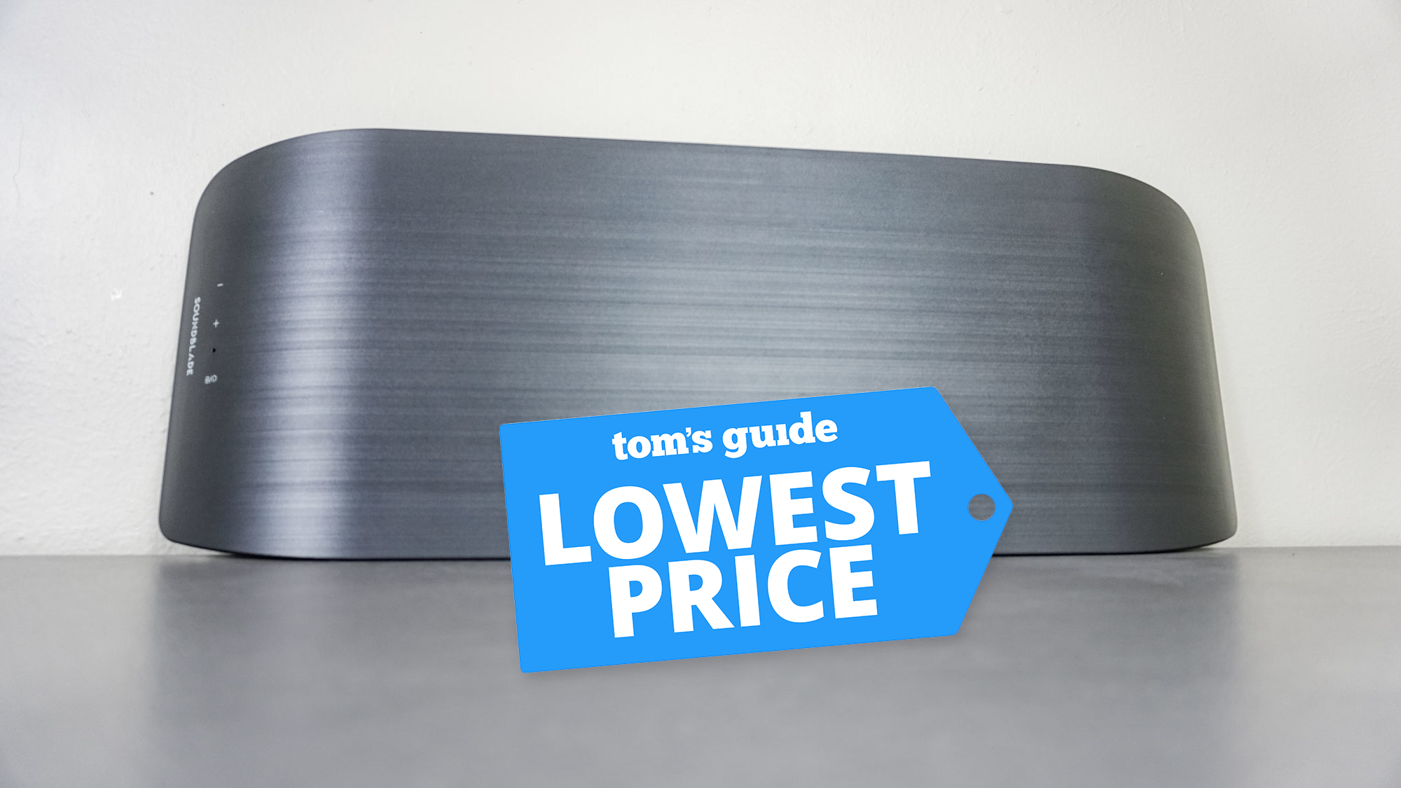 The BlueAnt Soundblade on its side with a Tom&#039;s Guide Lowest Price deals badge on top of it