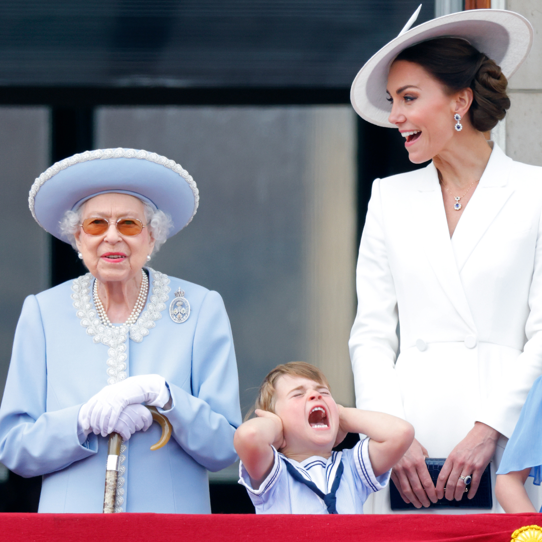 Queen Elizabeth and Kate Middleton watch a flypast from the balcony of Buckingham Palace during Trooping the Colour on June 2, 2022 in London, England