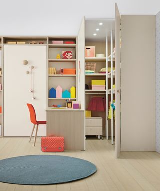 How to design a kid's room: Children's bedroom with a desk and handy storage by Go Modern