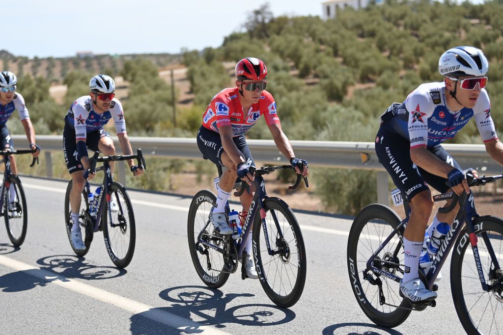 MONTILLA SPAIN SEPTEMBER 02 Remco Evenepoel of Belgium and Team QuickStep Alpha Vinyl Red Leader Jersey competes during the 77th Tour of Spain 2022 Stage 13 a 1684km stage from Ronda to Montilla 315m LaVuelta22 WorldTour on September 02 2022 in Montilla Spain Photo by Justin SetterfieldGetty Images