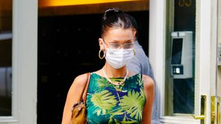 Bella Hadid wears a tropical top when departing her apartment on September 04, 2020 in New York City.