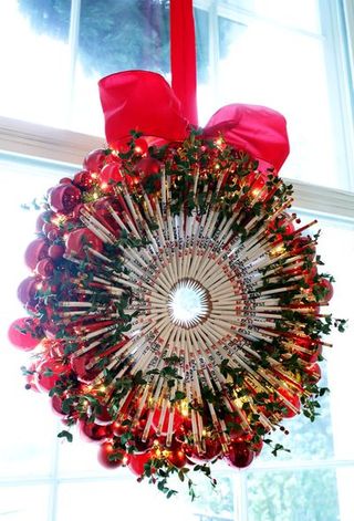 Wreath, Red, Christmas decoration, Flower, Plant, Interior design, Floral design, Cut flowers,