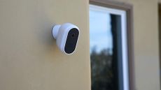 Swann Wireless Security Camera mounted to outside concrete wall