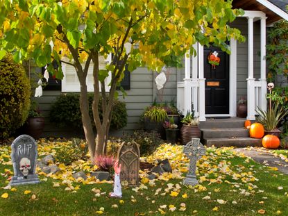 A front yard with halloween decorations
