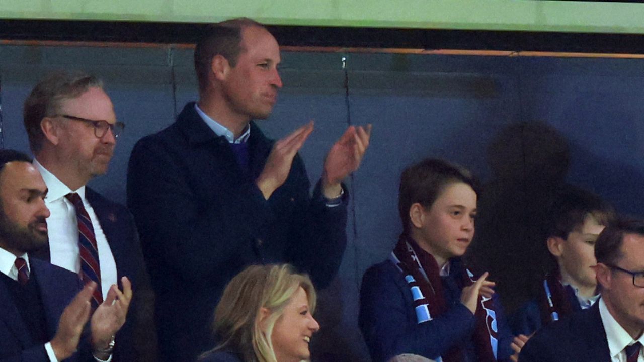 Prince William, Prince of Wales and Prince George of Wales look on alongside Tyrone Mings of Aston Villa during the UEFA Europa Conference League 2023/24 Quarter-final first leg match between Aston Villa and Lille OSC at Villa Park on April 11, 2024 in Birmingham, England.