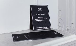 Black card with white print