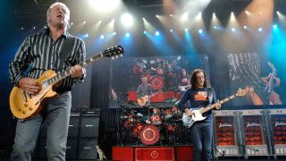 Rush’s Alex Lifeson and Geddy Lee performing onstage in 2007