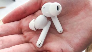 Oppo Enco Free2 earbuds in reviewer's hand