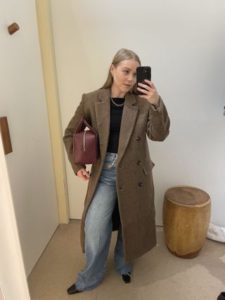 Woman wears full Reformation outfit