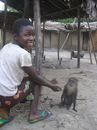 The picture that started it all: Georgette with her monkey friend.