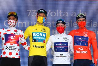 Riders wear face masks on the podium of the Volta a la Comunitat Valenciana