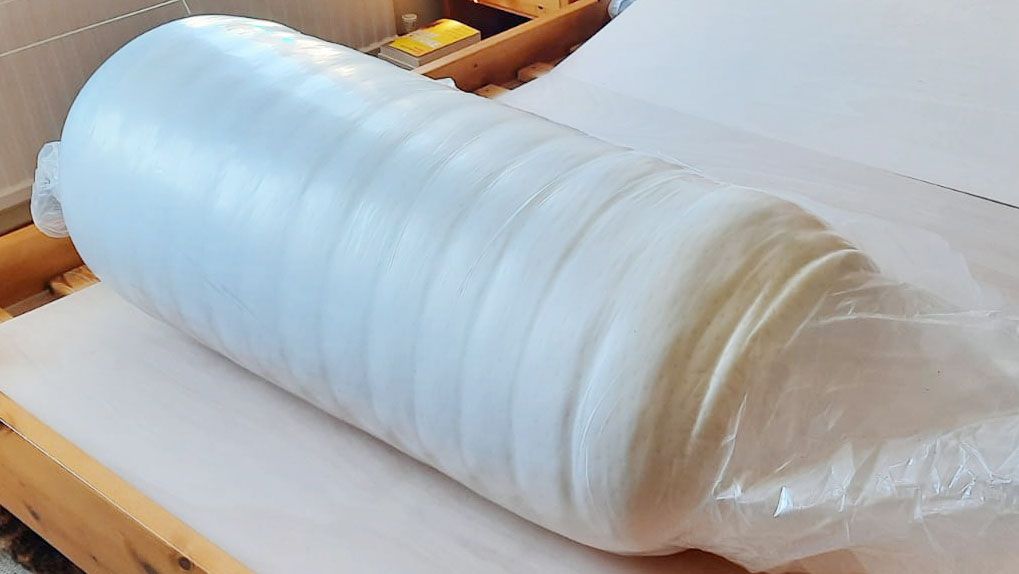 SleepOvation mattress, rolled up