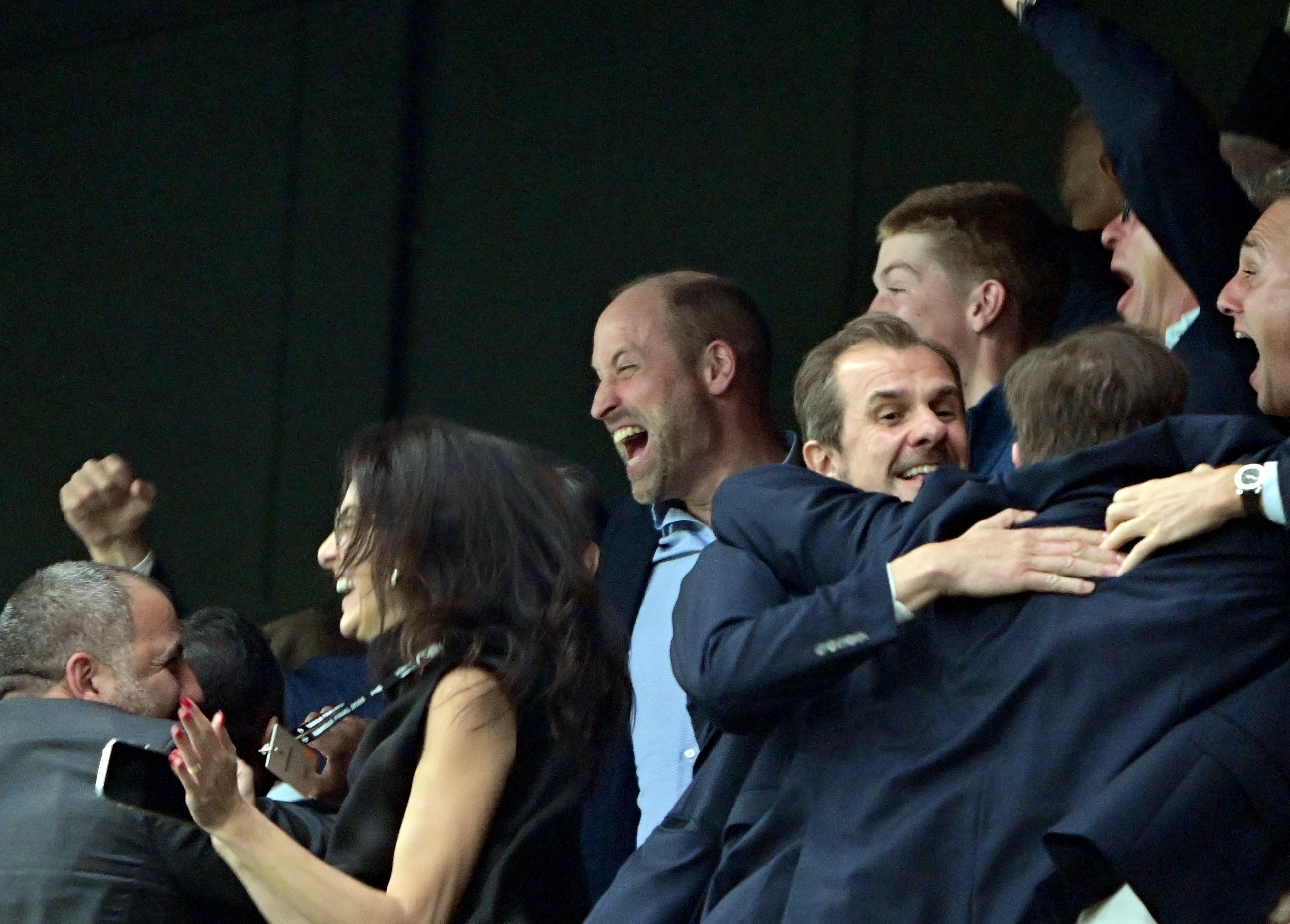 Prince William cheering at an Aston Villa match