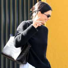 Kendall Jenner elevated her comfy-cozy crewneck and sweatpants with red ballet flats