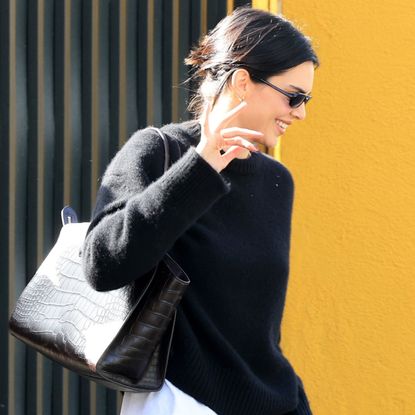 Kendall Jenner elevated her comfy-cozy crewneck and sweatpants with red ballet flats