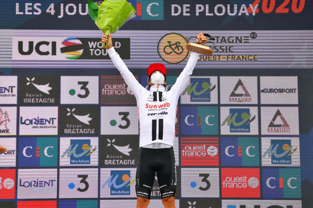 PLOUAY FRANCE AUGUST 25 Podium Michael Matthews of Australia and Team Sunweb Celebration Mask Trophy Flowers Covid safety measures during the 84th Bretagne Classic OuestFrance 2020 a 2478km race from Plouay to Plouay GrandPrixPlouay GPPlouay on August 25 2020 in Plouay France Photo by Luc ClaessenGetty Images