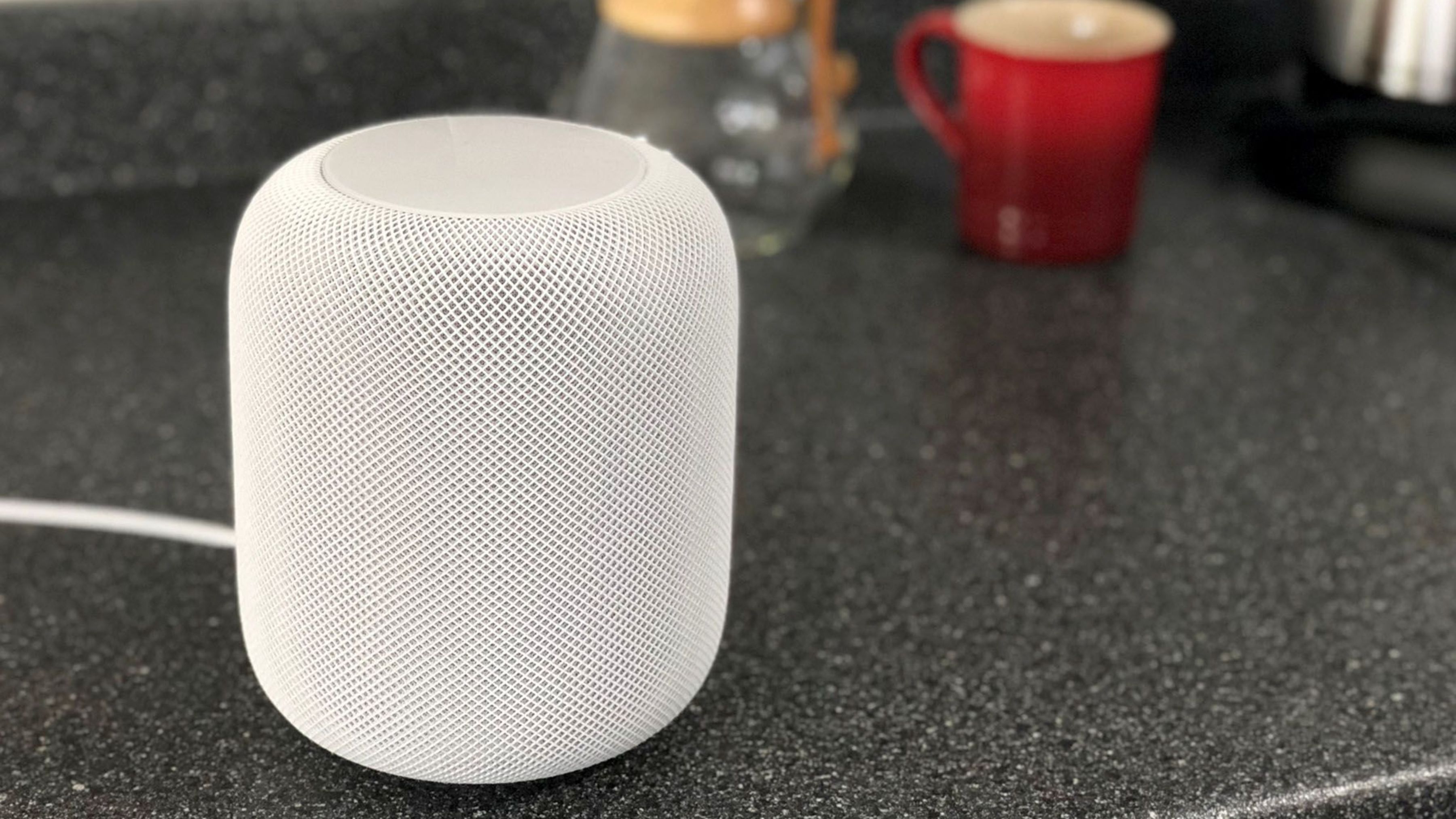 HomePod sitting on a Kitchen counter