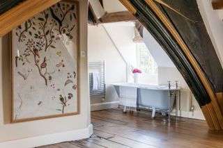 traditional bathroom with wall art