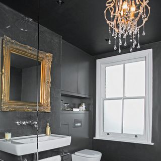 black bathroom with painted ceiling