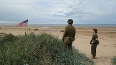 Two World War Two re-enactors at Omaha Beach in Normandy ahead of the 75th anniversary of D-Day in 2019