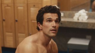 Paul Anthony Kelly shirtless in a locker room in Love Story.
