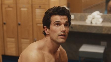 Paul Anthony Kelly shirtless in a locker room in Love Story.