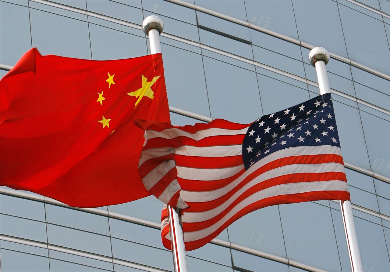 Chinese and American flags wave in Beijing