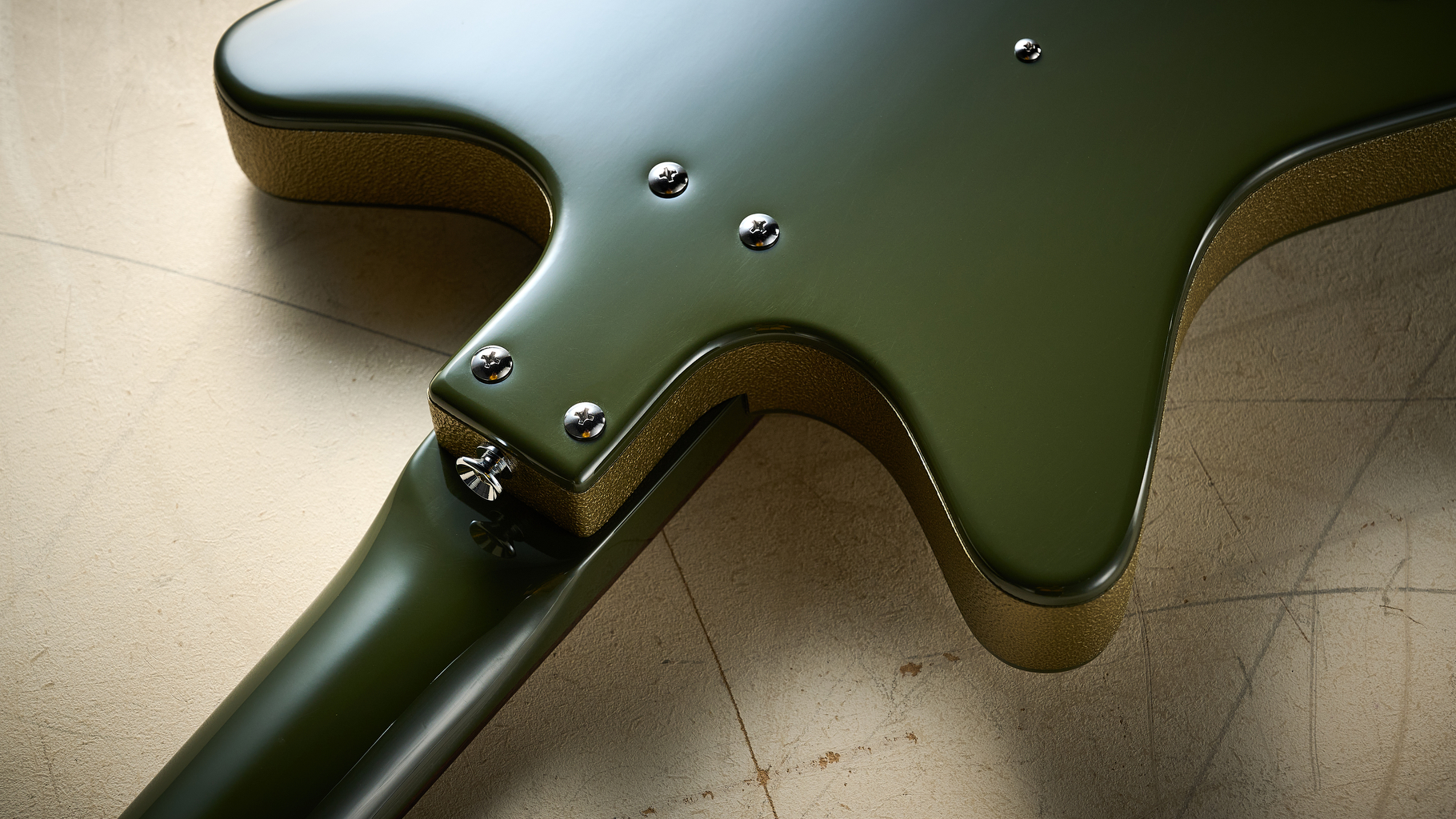 The neck joint of the Danelectro Dan O Cool Baritone guitar