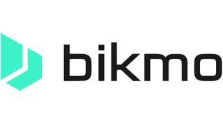 The Bikmo logo, black text on a white background with two green chevron shapes on the left
