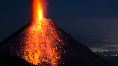 Image from V-Day: Volcanic Planet showing an erupting volcano.