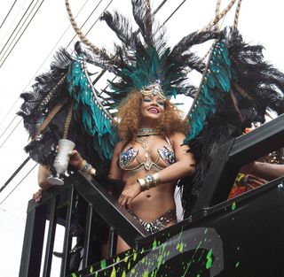 8/4/15* Bridgetown, Barbados - Rihanna shows off her bikini bod for Carnival Festival.