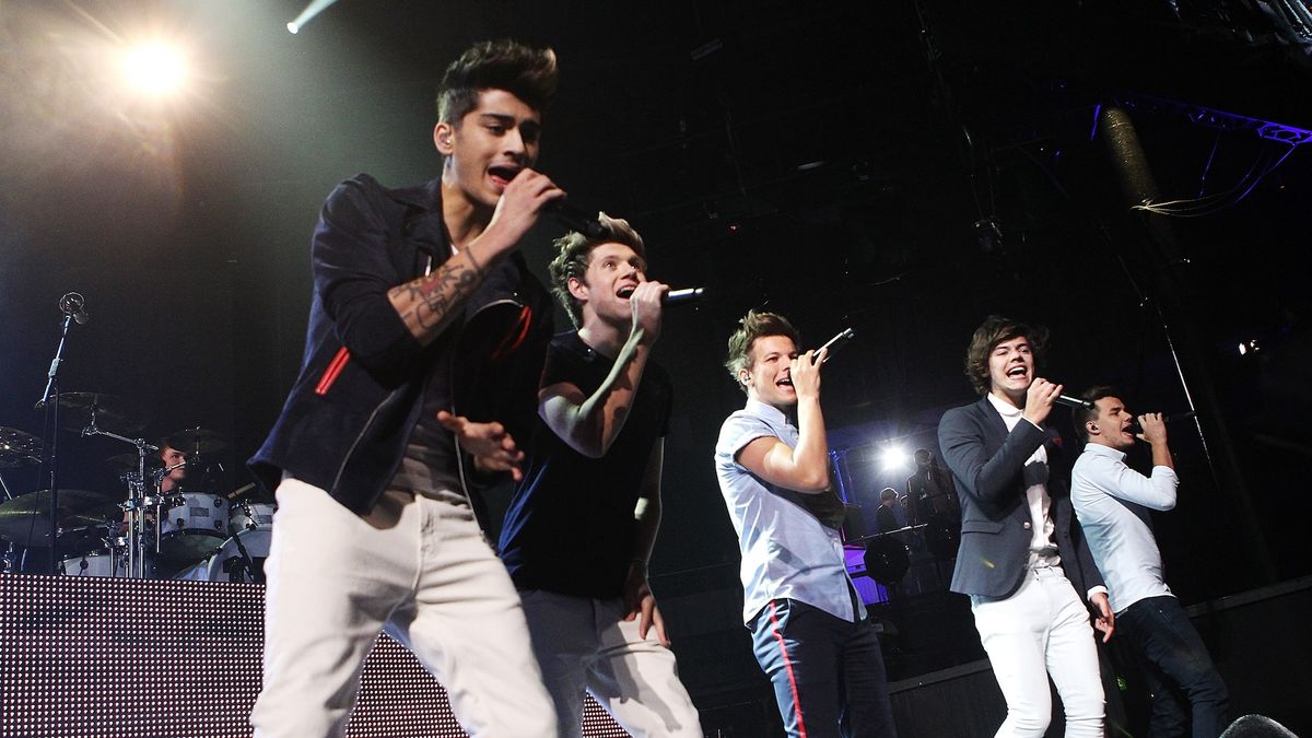 a photo of One Direction performing on stage