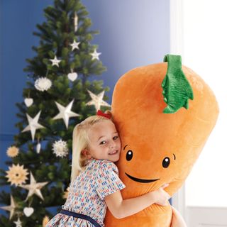 carrot toy and girl hug
