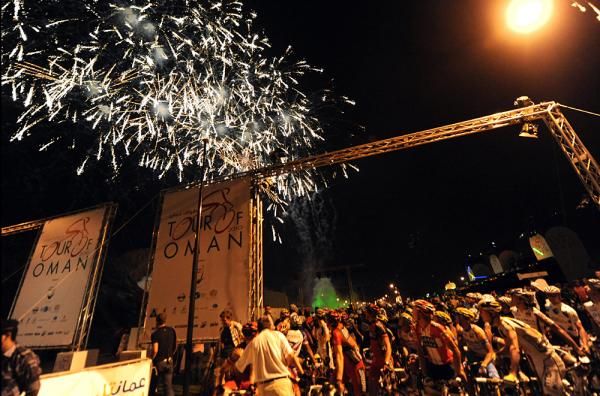 The peloton watches some fireworks that kicked off the first Tour of Oman