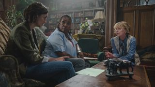 Cara Horgan as Becks, Jo Martin as Suzie and Samantha Bond as Judith sit together and go through evidence in The Marlow Murder Club.
