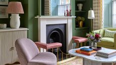 green living room with alcoves with both freestanding and fitted storage