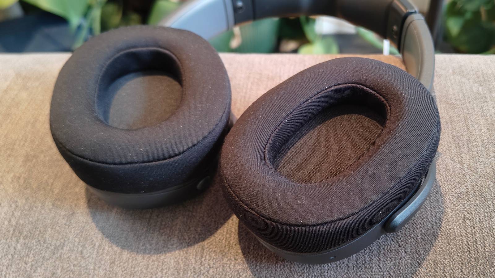 The Skullcandy Crusher 540 Active on a sofa.