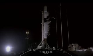 A SpaceX Falcon 9 rocket, seen here in a still from a launch webcast, suffered a launch abort just before an attempted liftoff carrying 60 Starlink internet satellites on Feb. 28, 2021.