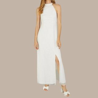 flat lay image of white halterneck dress