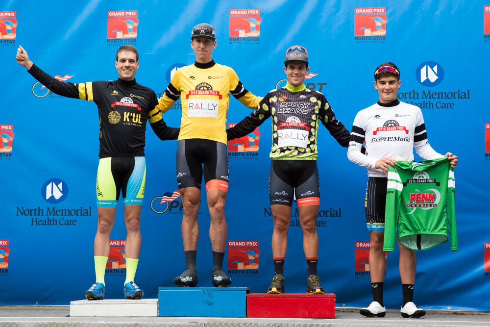 Teammate Evan Huffman, who finished third in the TT, joins Zirbel on the classification podium with the KOM jersey in hand.