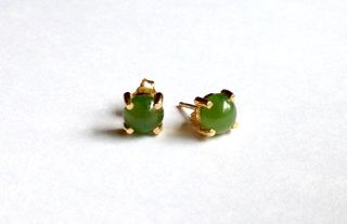 A pair of jadeite jade earrings from Alaska.